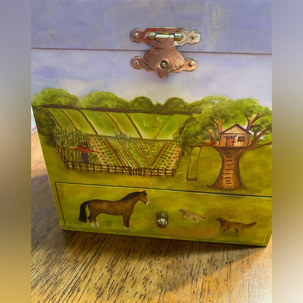 Enchantmints horse mirrored music box with small drawers.